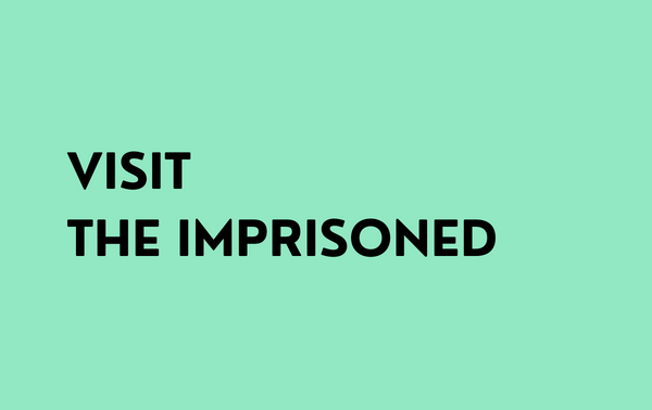 Black inscription "Visit the imprisoned" on a green background.